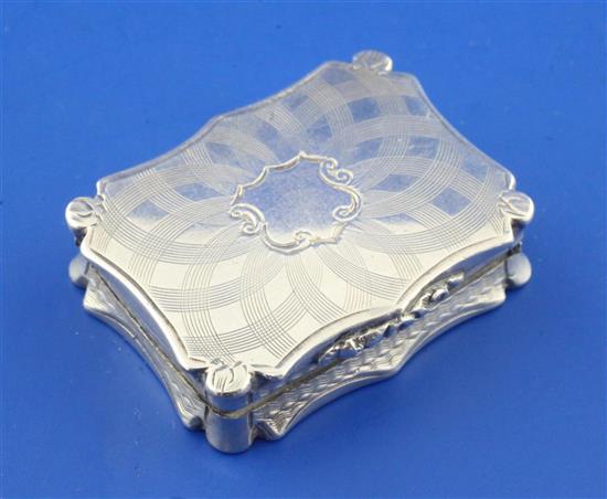 An early Victorian silver vinaigrette by Nathaniel Mills, 1.5in.